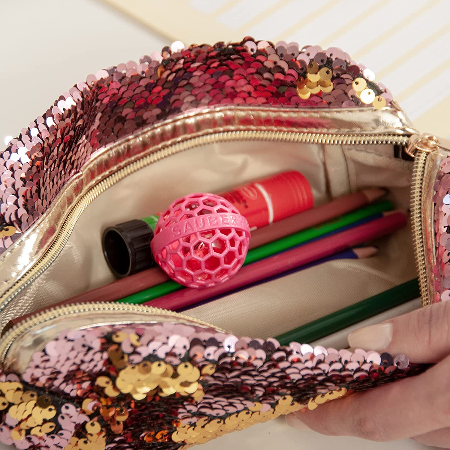 The Clean Ball - Keep your Bags Clean - Sticky Inside Ball Picks up Dust, Dirt and Crumbs in your Purse, Bag, Or Backpacks
